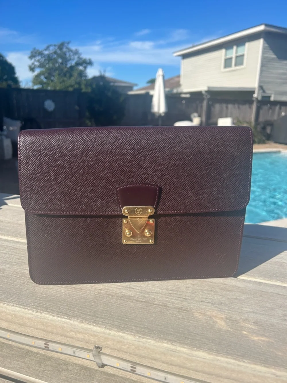 Louis Vuitton Taiga Kourad Clutch